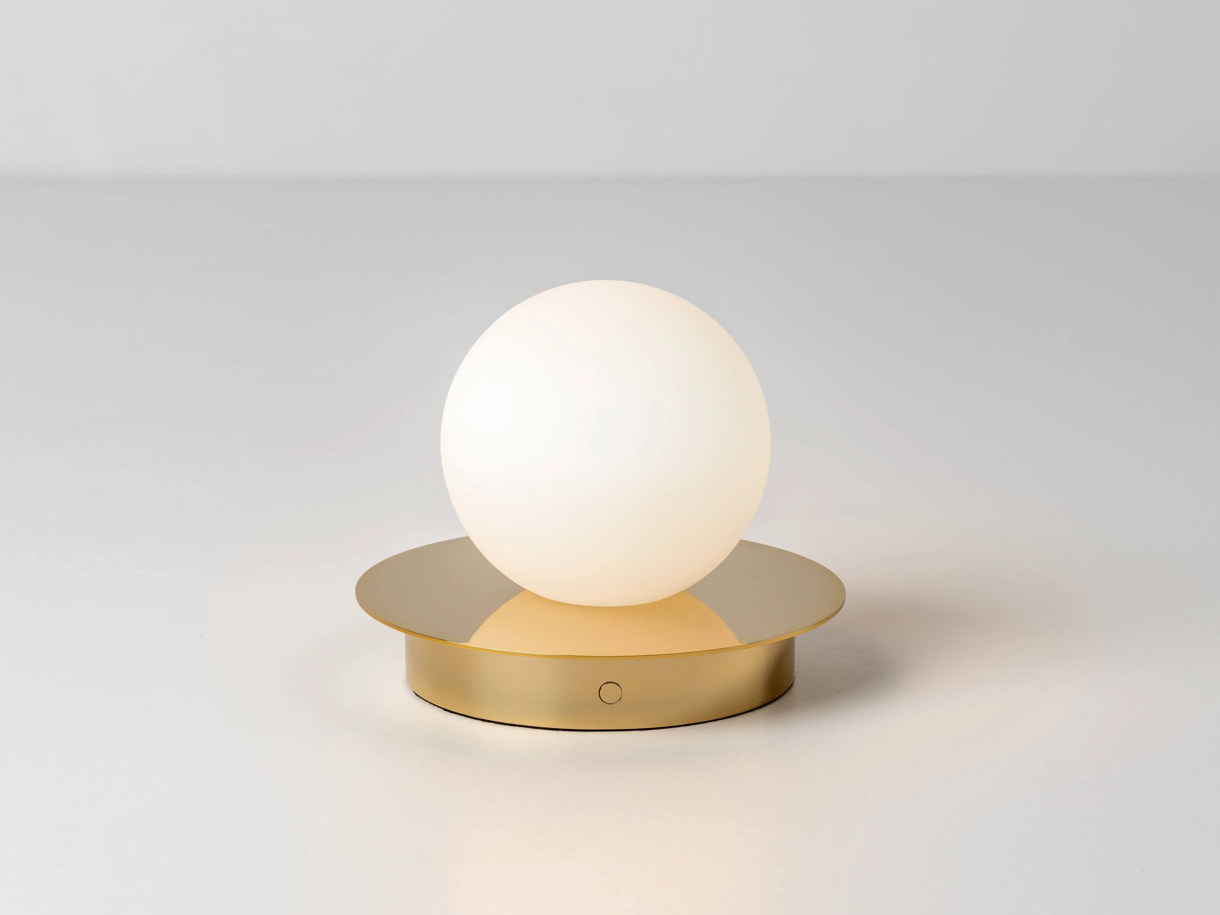 Brass opal disk cordless table lamp