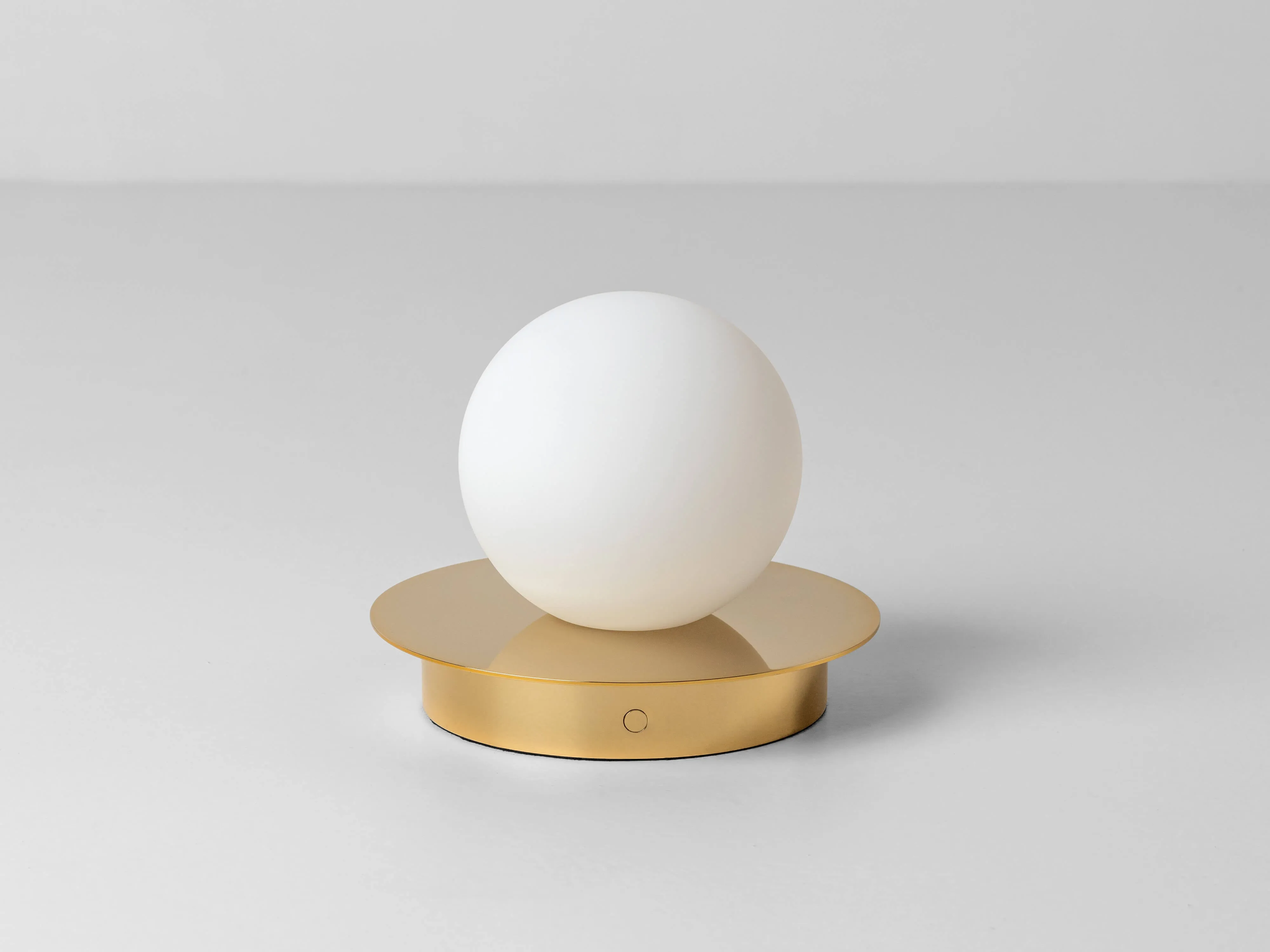 Brass opal disk cordless table lamp