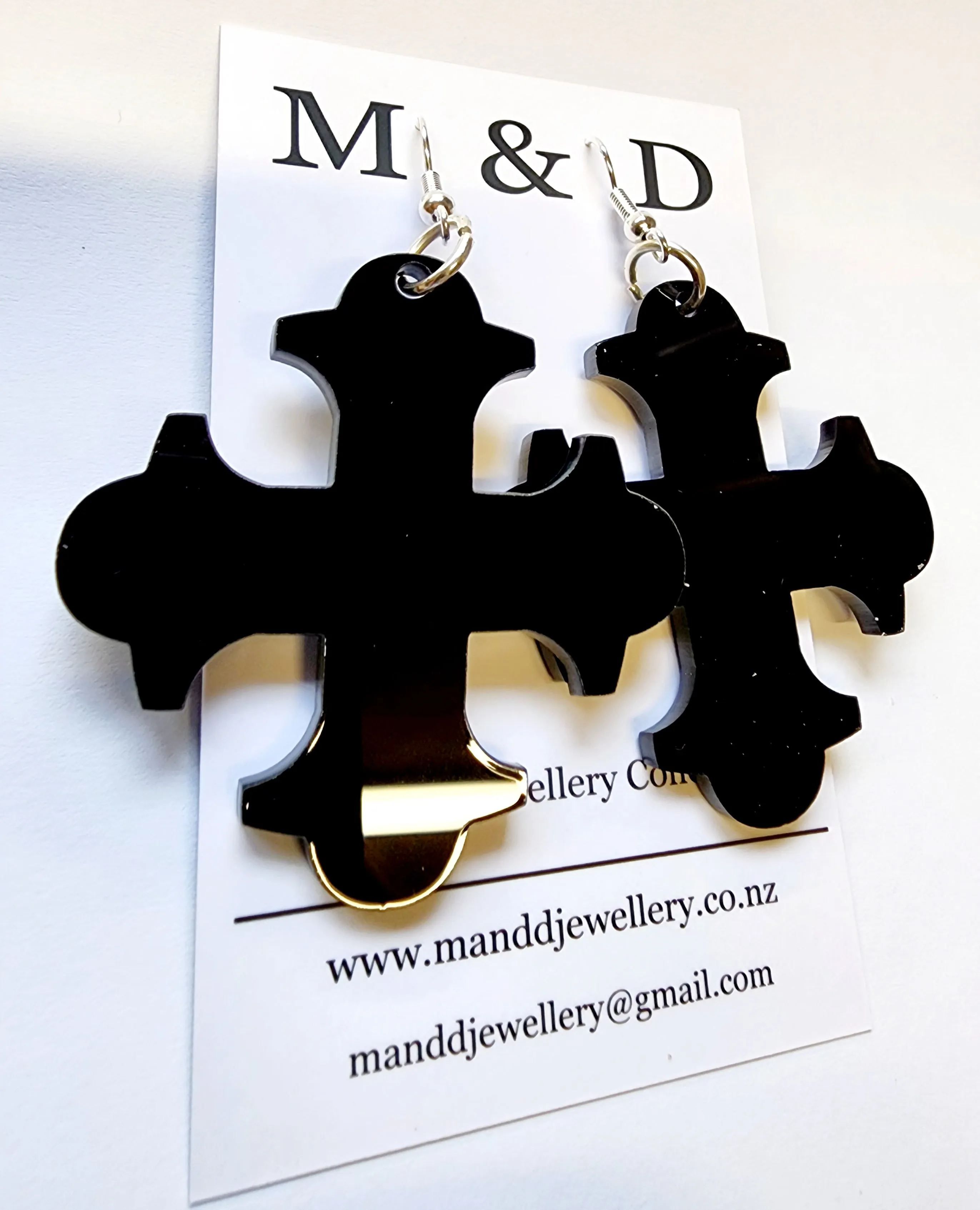 Cross Botonee dangle earrings