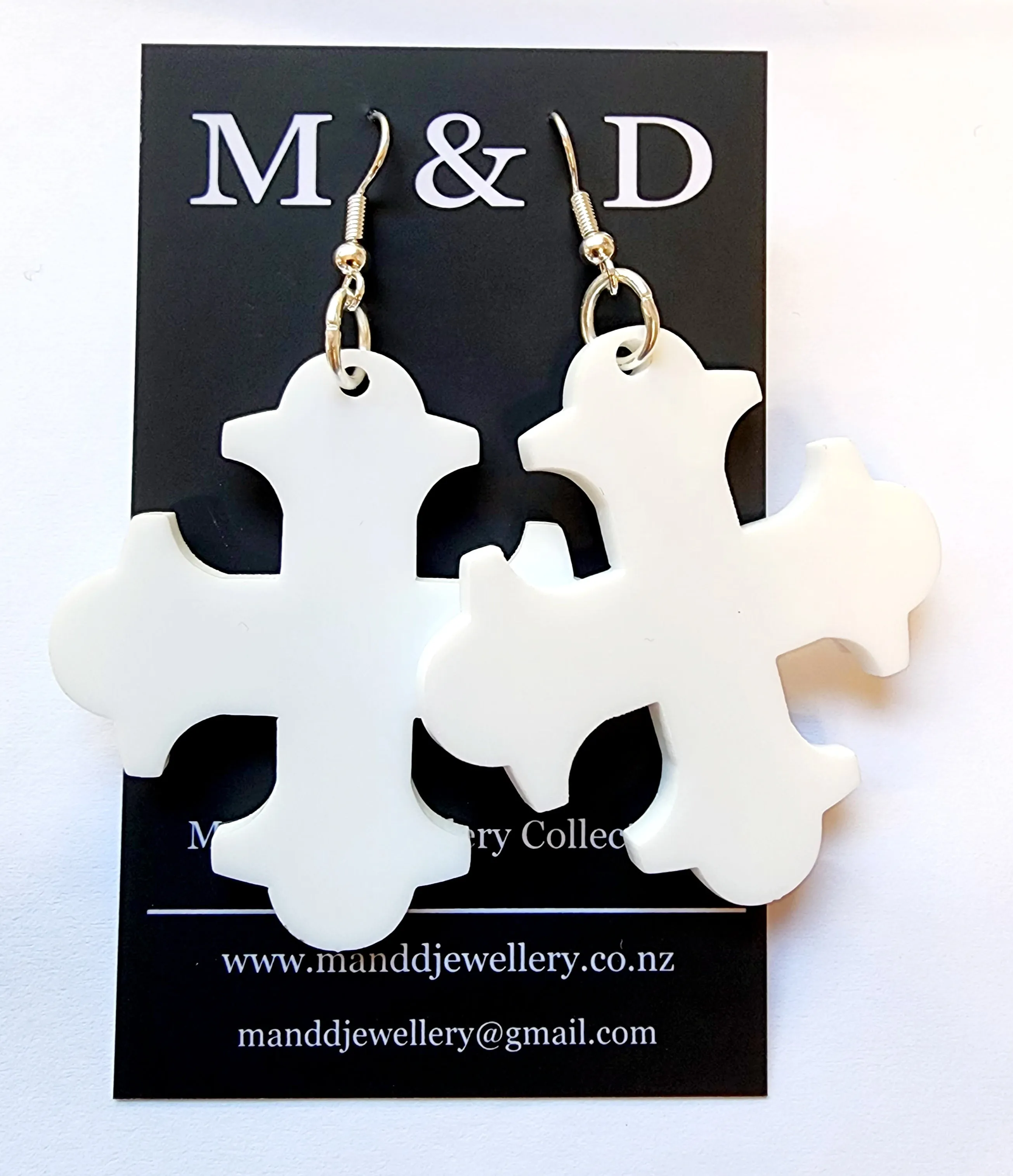 Cross Botonee dangle earrings