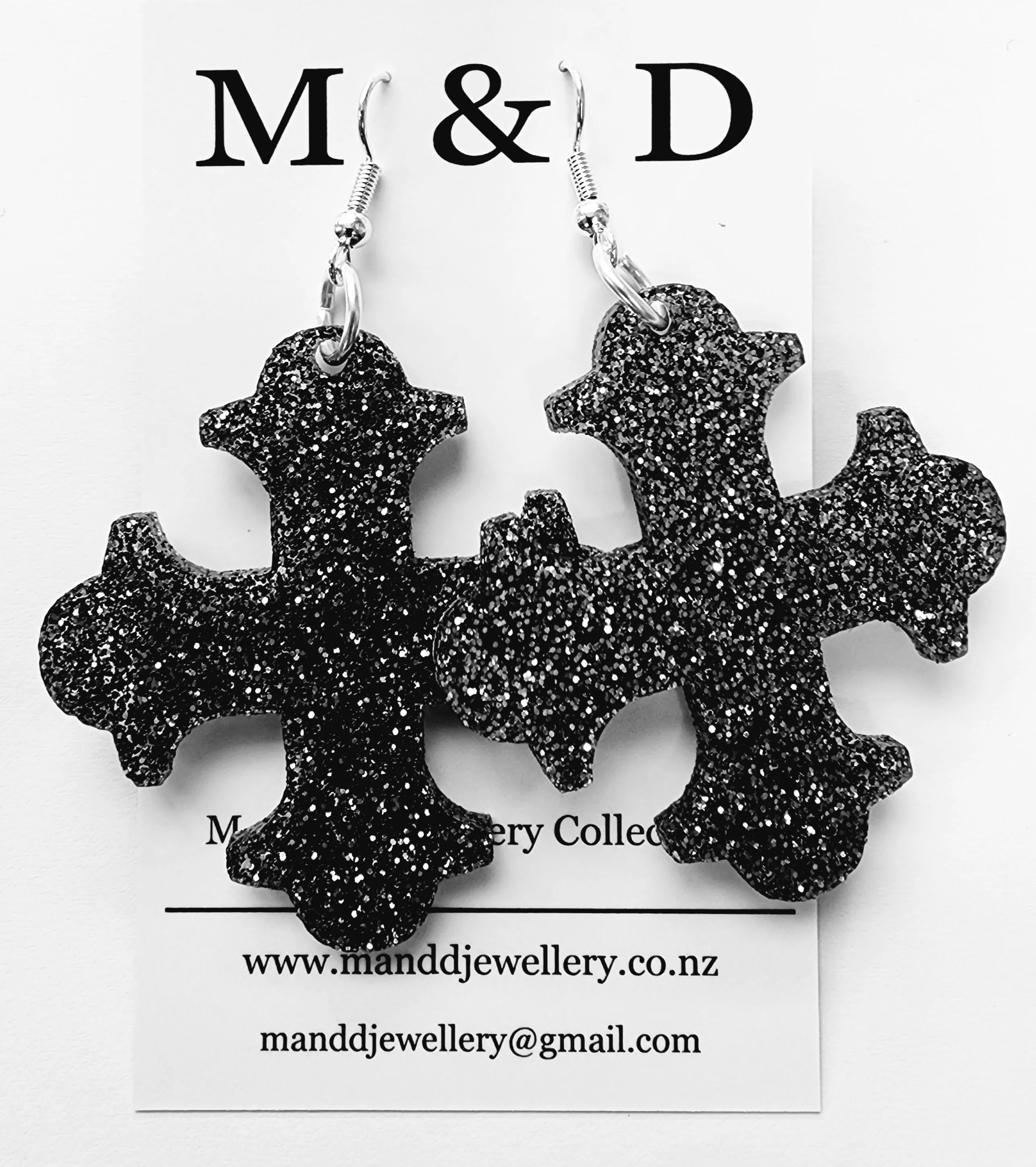 Cross Botonee dangle earrings