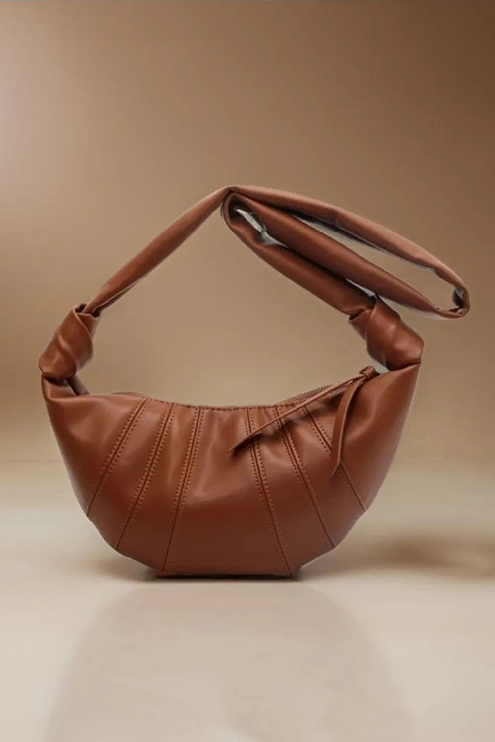 Seamed All In Vegan Leather Croissant Crossbody Bag