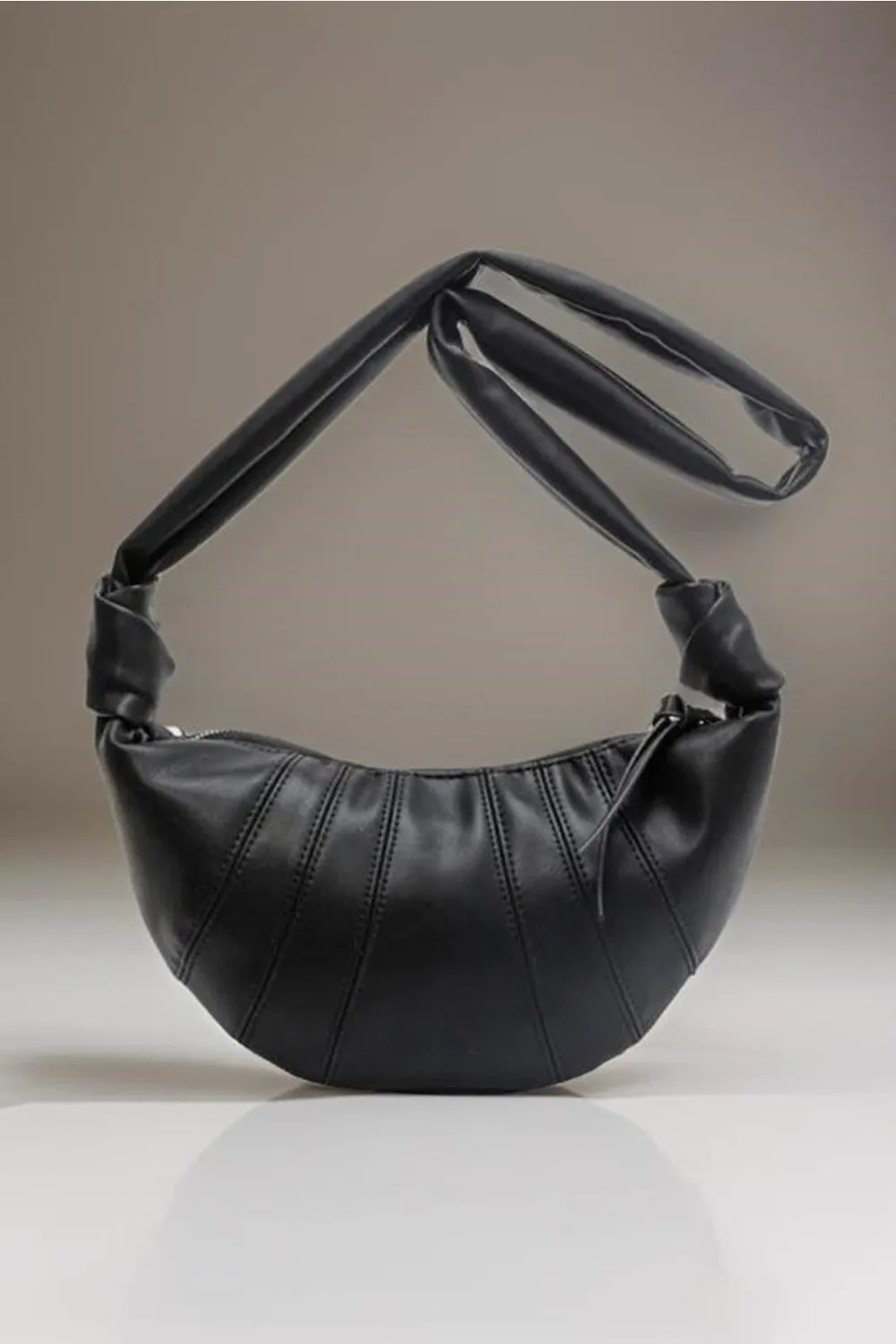 Seamed All In Vegan Leather Croissant Crossbody Bag