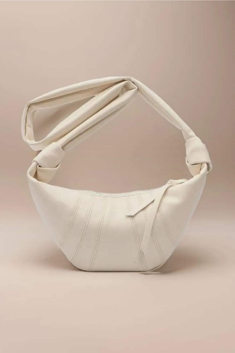 Seamed All In Vegan Leather Croissant Crossbody Bag